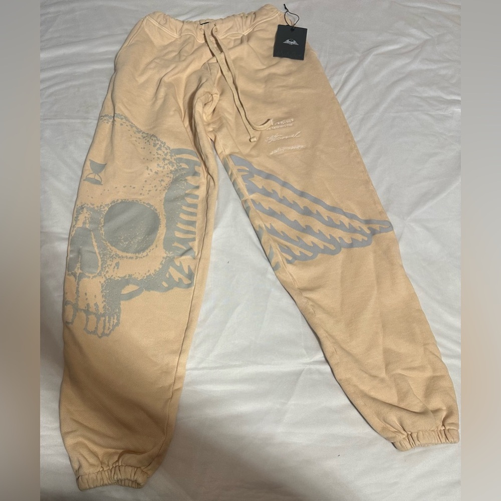 Civil Regime x No Tomorrow Women’s Beige Joggers with Skull and Wings Design